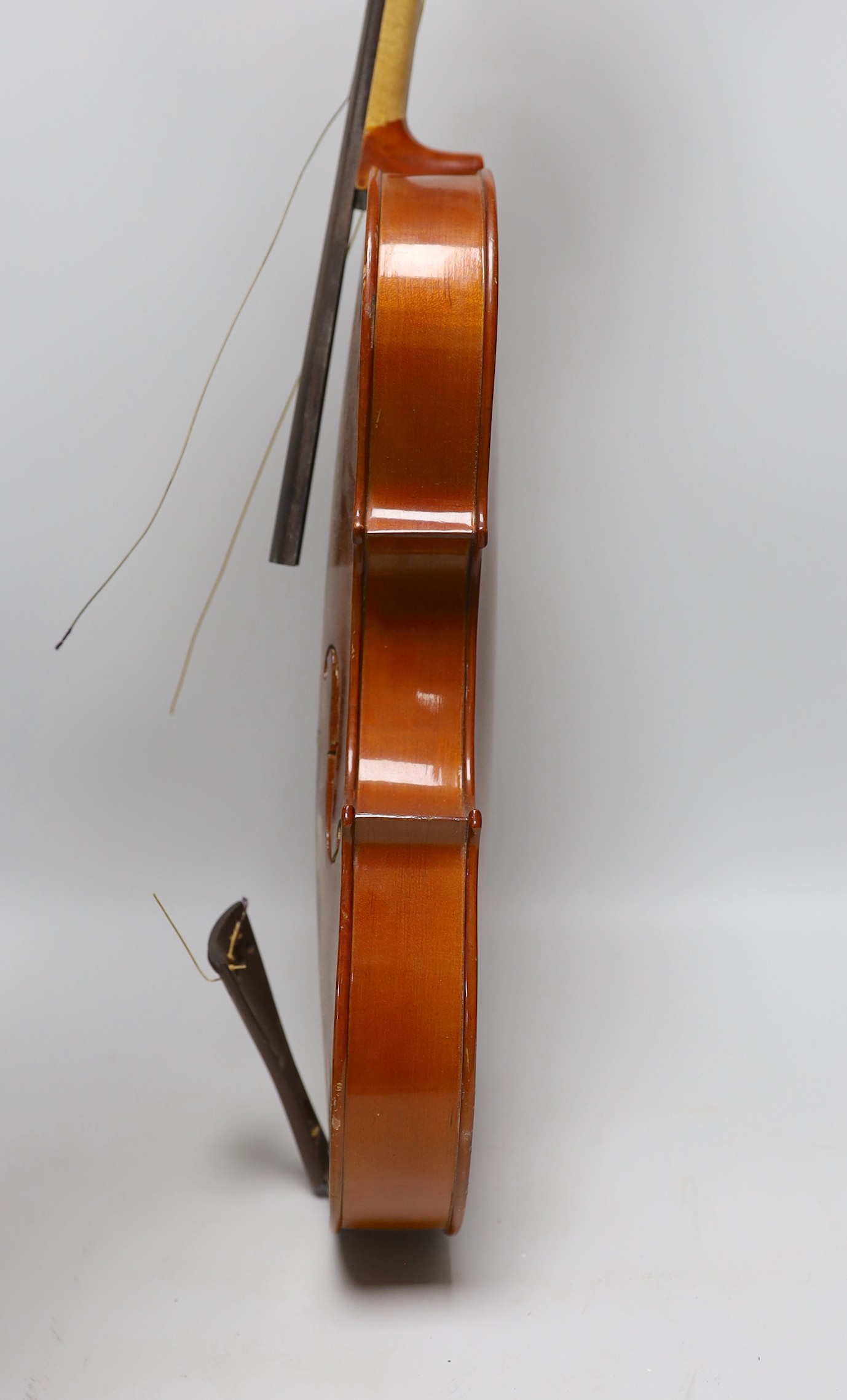 A cased viola and bow, viola back measures, 40.5cm
